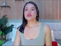 I am a subtle mixture between sweetness and desire. My voice has the softness of a whisper that wraps you, and my laugh, that naughty touch that awakens curiosity. I like to cause delicacy, with looks that say more than they call, and gestures that suggest without hurry.